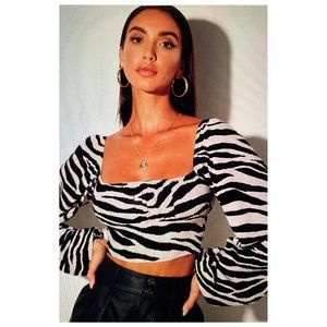 MOTEL CROP TOP IN ZEBRA PRINT SIZE MEDIUM